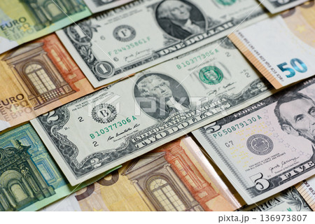Euro and dollar banknotes, exchange, sales, economic tariffs and taxes. Euros and dollars 136973807