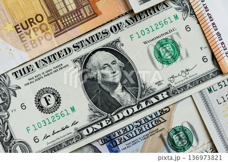 Euro and dollar banknotes, exchange, sales, economic tariffs and taxes. Euros and dollars Euro and dollar banknotes, exchange, sales, economic tariffs and taxes. Euros and dollars 136973821