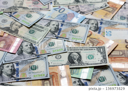 Euro and dollar banknotes, exchange, sales, economic tariffs and taxes. Euros and dollars 136973829