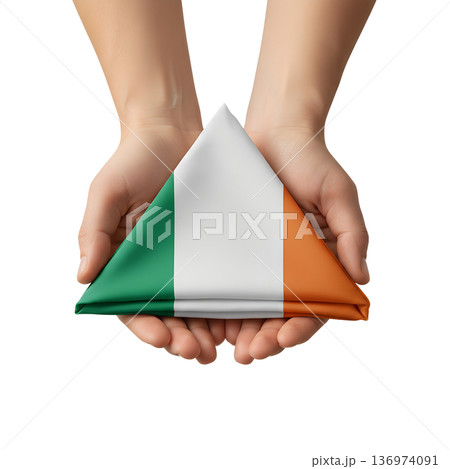 Two hands gently and respectfully holding the folded national flag of ireland the tricolour, representing patriotism, respect, and heritage 136974091