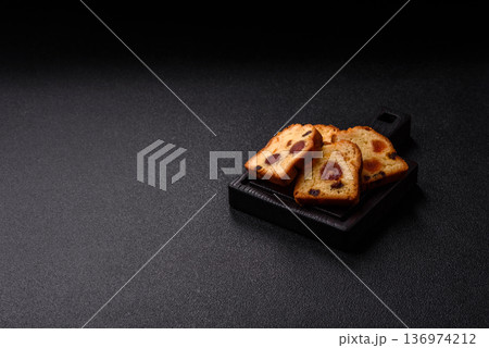 Fruit cake, a dessert with cherries, plums, and raisins for a festive Christmas table. Fruit cake 136974212