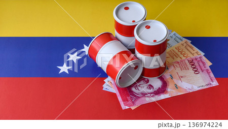 Metal barrels of oil, gas, or chemicals on the Venezuelan flag, Venezuela production. Barrels of oil 136974224