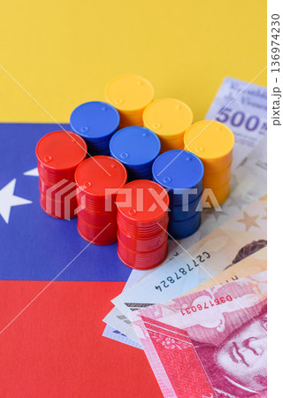 Metal barrels of oil, gas, or chemicals on the Venezuelan flag, Venezuela production. Barrels of oil Metal barrels of oil, gas, or chemicals on the Venezuelan flag, Venezuela production. Barrels of oil 136974230