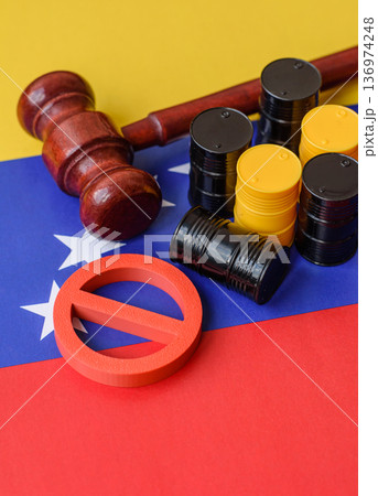 Barrels of oil, gas, or chemicals on the venezuelan flag and a ban sign. Barrels of venezuela oil Barrels of oil, gas, or chemicals on the venezuelan flag and a ban sign. Barrels of venezuela oil 136974248