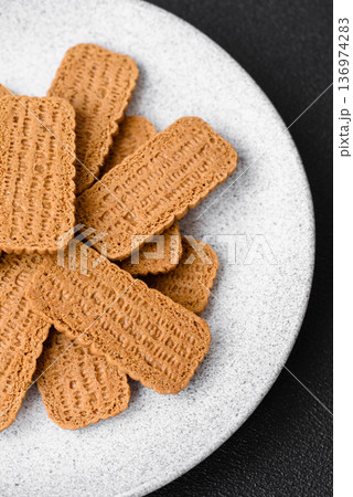 Caramel biscuit cookies, or shortbread, are a healthy breakfast food. Biscuit cookies Caramel biscuit cookies, or shortbread, are a healthy breakfast food. Biscuit cookies 136974283