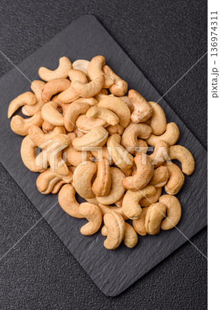 Roasted or raw cashew make a savory snack for a healthy, filling meal. Cashew nuts 136974311