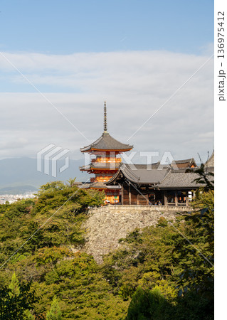 Historic temple on a hillside overlooking Kyoto, Japan city skyline 136975412