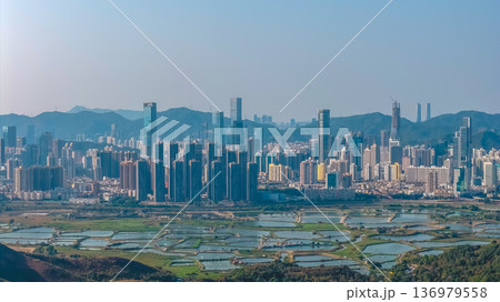 Ma Tso Lung wetlands overlooking towering Shenzhen urban skyline Feb 18 2026 Ma Tso Lung wetlands overlooking towering Shenzhen urban skyline Feb 18 2026 136979558