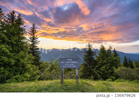 Scenic drive road trip on Blue Ridge Parkway in North Carolina Appalachian mountains. Mt Mitchell overlook observation point Scenic drive road trip on Blue Ridge Parkway in North Carolina Appalachian mountains. Mt Mitchell overlook observation point 136979626