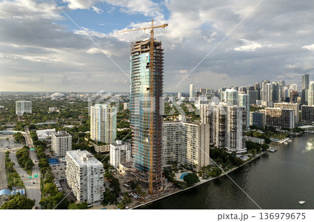 Miami, Florida. Developing American megapolis with new high-rise building under construction 136979675