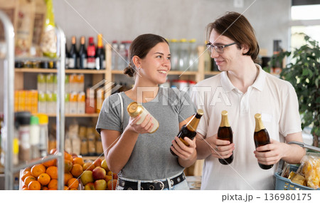 Couple chooses beer 136980175