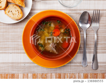 Fresh portion of meat soup served in bowl Fresh portion of meat soup served in bowl 136980555