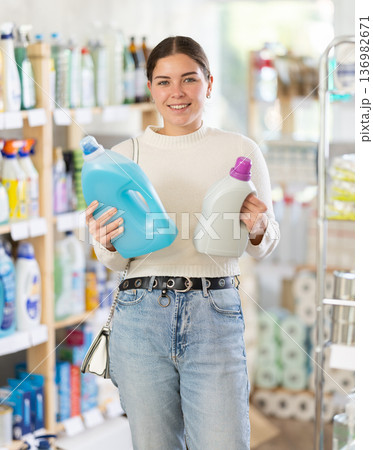 woman chooses sitting products for her home 136982671