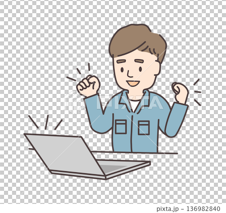 A young man in work clothes making a fist pump in front of a computer 136982840