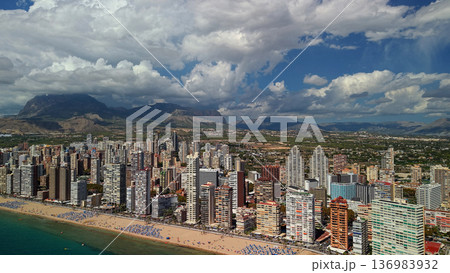 Aerial view of Benidorm skyline and Levante beach coastline with skyscrapers and Mediterranean Sea Spain Aerial view of Benidorm skyline and Levante beach coastline with skyscrapers and Mediterranean Sea Spain 136983932