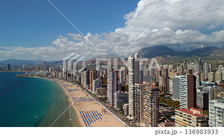 Aerial view of Benidorm skyline and Levante beach coastline with Mediterranean sea Spain 136983933