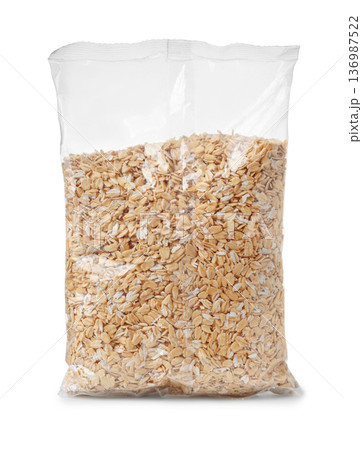 Dry rolled oatmeal in transparent plastic bag Dry rolled oatmeal in transparent plastic bag 136987522