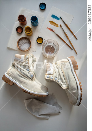 Plain canvas boots ready for repainting. Preparing shoes for customization . Plain canvas boots ready for repainting. Preparing shoes for customization . 136987582
