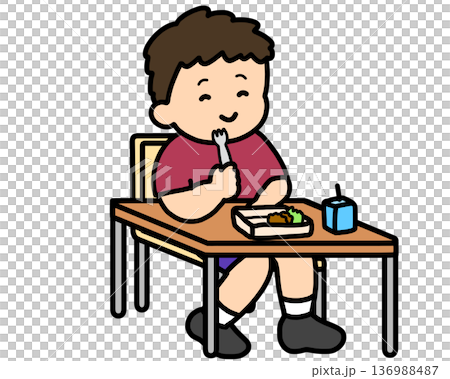 一名亞裔男孩在教室裡用叉子吃午餐。 一名亞裔男孩在教室裡用叉子吃午餐。 136988487