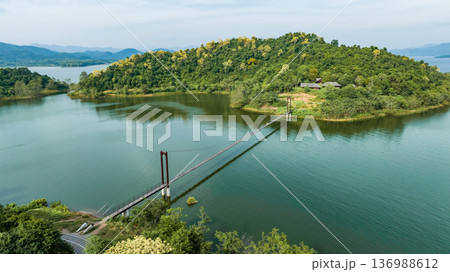 The suspension bridge is emphasizes beauty for tourism. A suspension bridge is a bridge that is difficult to calculate in the construction of engineers. 136988612