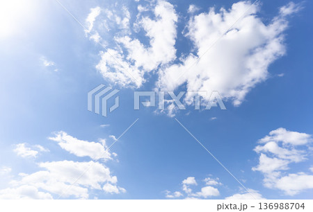 Clouds in the blue sky, Panoramic stage by light background during the summer day. Clouds in the blue sky, Panoramic stage by light background during the summer day. 136988704
