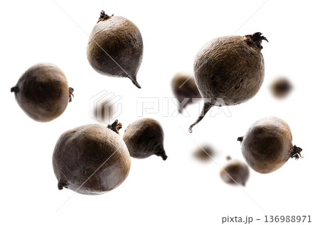 Ripe beets levitate on a white background Ripe beets levitate on a white background 136988971