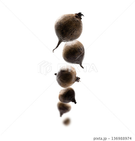 Ripe beets levitate on a white background 136988974