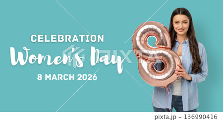 A young woman holds a balloon while celebrating Women's Day A young woman holds a balloon while celebrating Women's Day 136990416