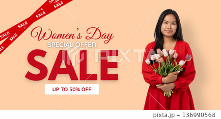 Woman holds flowers and promotes a sale for Women's Day Woman holds flowers and promotes a sale for Women's Day 136990568