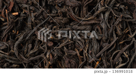 Pile of black tea on white background. Pile of black tea on white background. 136991018