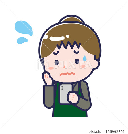 スマートフォンを使う「飲食店の店員」の女性 136992761