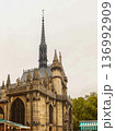 Sainte chapelle, paris, france, showcasing its intricate gothic architecture, historic spire, and old stone facade 136992909
