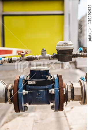 Water meter and pipeline control system near parking barrier in rome italy 136992936