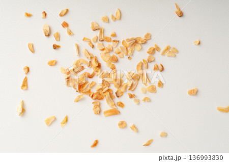 Dry Garlic Slices, Crispy Fried Cloves Pile Closeup, Roasted Grilled Garlic Flakes, Clove Chip Group Dry Garlic Slices, Crispy Fried Cloves Pile Closeup, Roasted Grilled Garlic Flakes, Clove Chip Group 136993830