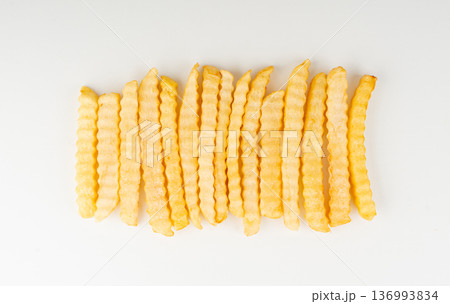 Frozen potato sticks isolated, iced finger chips 136993834