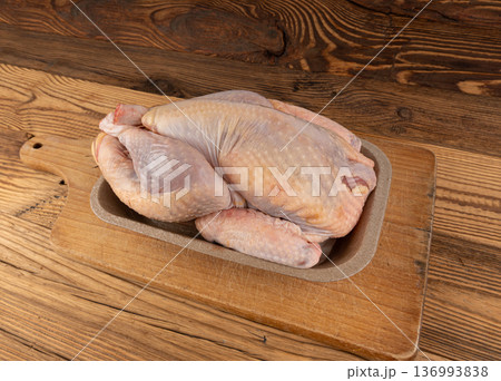 Helmeted guinea fowl raw meat Helmeted guinea fowl raw meat 136993838