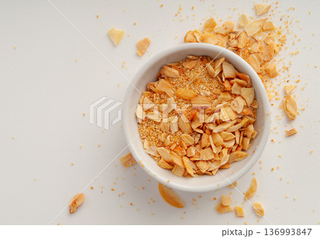 Dry Garlic Slices, Crispy Fried Cloves Pile Closeup, Roasted Grilled Garlic Flakes, Clove Chip Group Dry Garlic Slices, Crispy Fried Cloves Pile Closeup, Roasted Grilled Garlic Flakes, Clove Chip Group 136993847