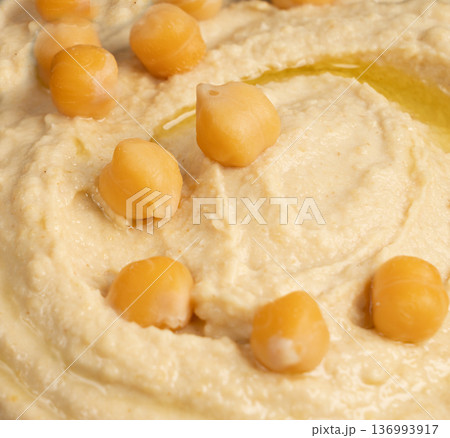 Hummus textured background, houmous dip pattern 136993917