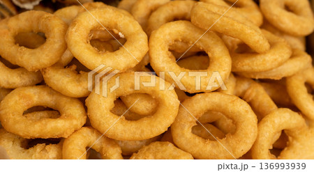 Calamari rings pattern, deep fry seafood textured background 136993939