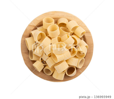 Raw Calamarata Big Pasta Isolated, Homemade Dry Macaroni, Italian Raw Round Noodle Raw Calamarata Big Pasta Isolated, Homemade Dry Macaroni, Italian Raw Round Noodle 136993949