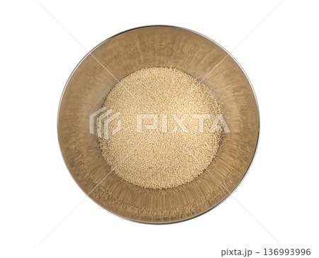Sesame seeds pile closeup, white small benne grains. Sesamum indicum fruits 136993996