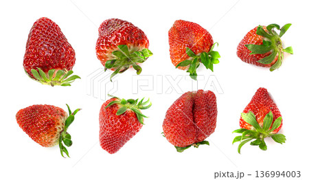 Fresh strawberry isolated, whole ripe straw berry, red juicy imperfect strawberri with green leaves Fresh strawberry isolated, whole ripe straw berry, red juicy imperfect strawberri with green leaves 136994003