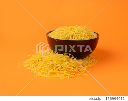 Raw vermicelli, gold soup pasta, small homemade noodles, thin Italy macaroni 136994012