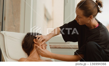 Gentle pressure and movement alleviate facial muscle tightness effectively 136994366