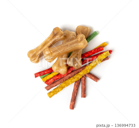 Rawhide bones, collagen dog chew food, pressed dry kibble, natural long-lasting canine treats Rawhide bones, collagen dog chew food, pressed dry kibble, natural long-lasting canine treats 136994733