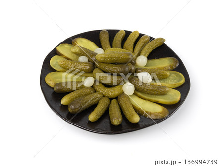 Pickled sliced cucumbers, fermented food, marinated canned vegetables, gherkins, pickles Pickled sliced cucumbers, fermented food, marinated canned vegetables, gherkins, pickles 136994739