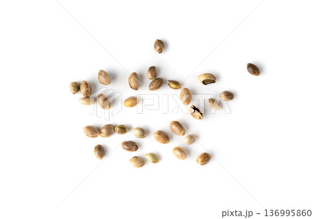 Hemp seeds isolated, scattered cannabis grains Hemp seeds isolated, scattered cannabis grains 136995860