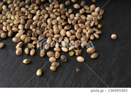 Hemp seeds pile texture background 136995865