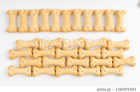 Dog biscuits, soft crunchy pet treats, flavored small canine cookie, bone shape biscuit, puppy food 136995885