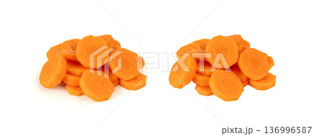 Round carrot slices isolated. Sweet orange vegetable cuts, fresh carrot circles pile 136996587
